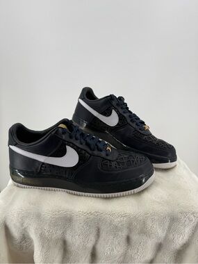 Nike Black Air Force 1 Sneakers with White Swoosh and Gold Lace Accents